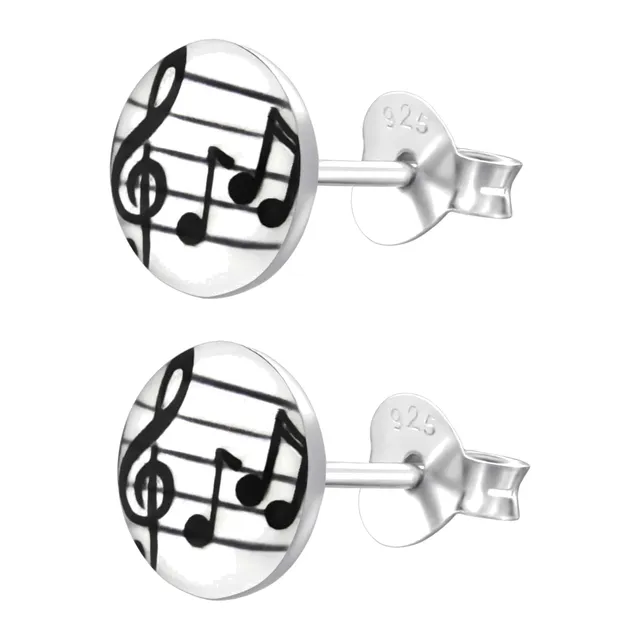 Pair of sterling silver treble clef music note stud earrings in black and white